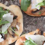 Flatbreads with Garlic Mushrooms, Parmesan & Rocket, a veg option to die for