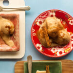 Steamed dumplings with cinnamon béchamel sauce