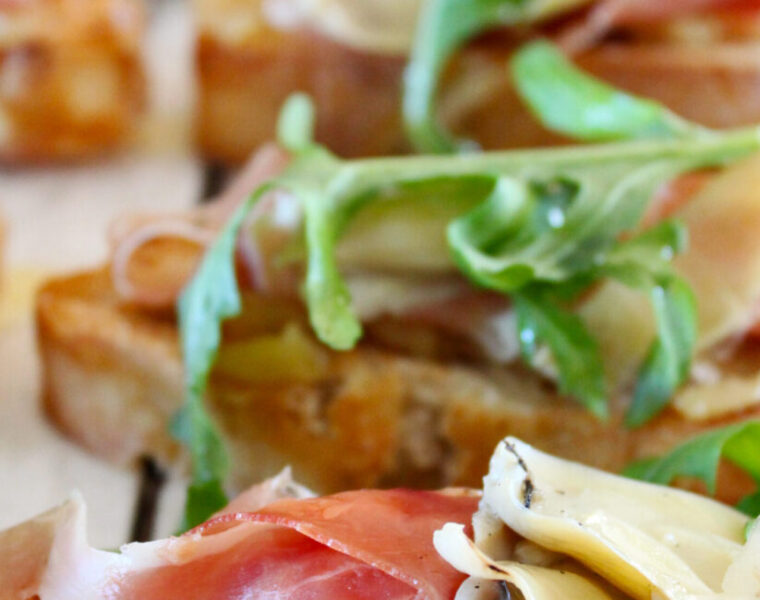 Bruschetta with Squashed Roasted Garlic, Marinated Artichokes and Parma Ham