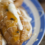 Granadilla Éclairs with White Chocolate Topping