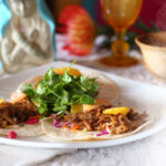 Duck Carnitas Served with an Orange and Pasilla Chilli Sauce