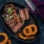 New York Strip Steak with Blue Cheese Bacon Crumble & Panko Onion Rings