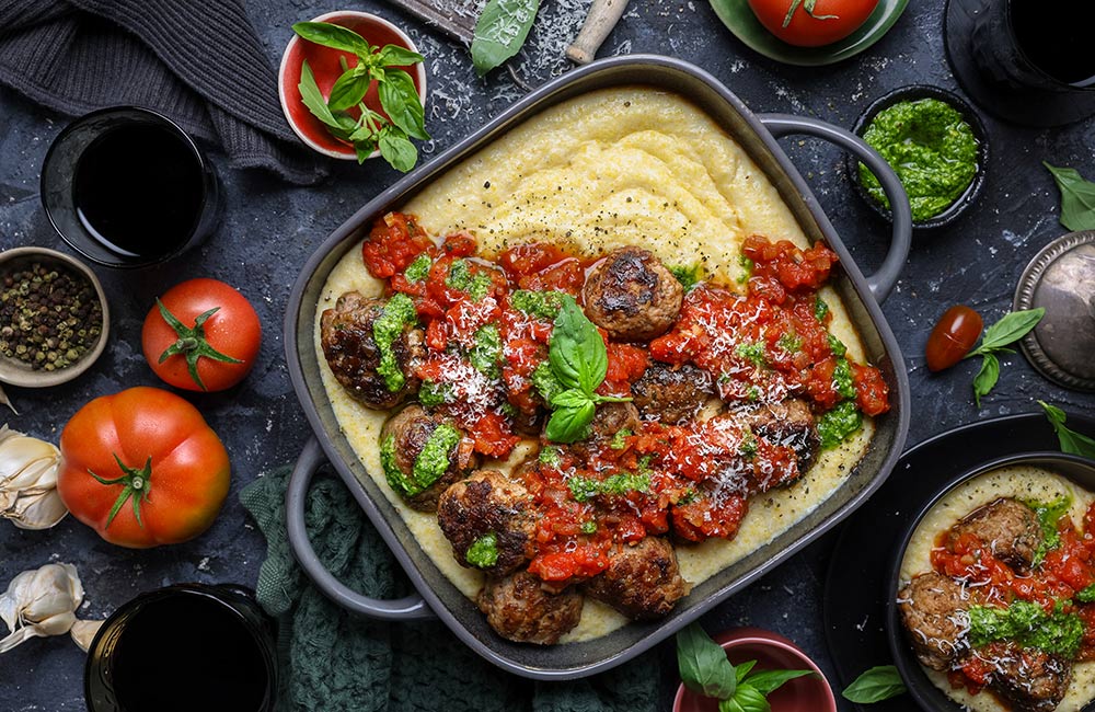 Pork Meatballs in Hearty Marinara Sauce over Cheesy Polenta