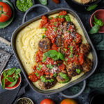 Pork Meatballs in Hearty Marinara Sauce over Cheesy Polenta