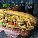 South African Heritage recipes. Pork Steak Gatsby with Mango Atchar Mayo for Cape Herb & Spice and SA Pork. Image by Crush Online